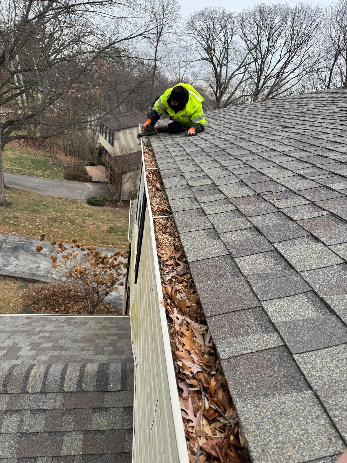 Gutter cleaning and maintenance work by Green Force Property Services
